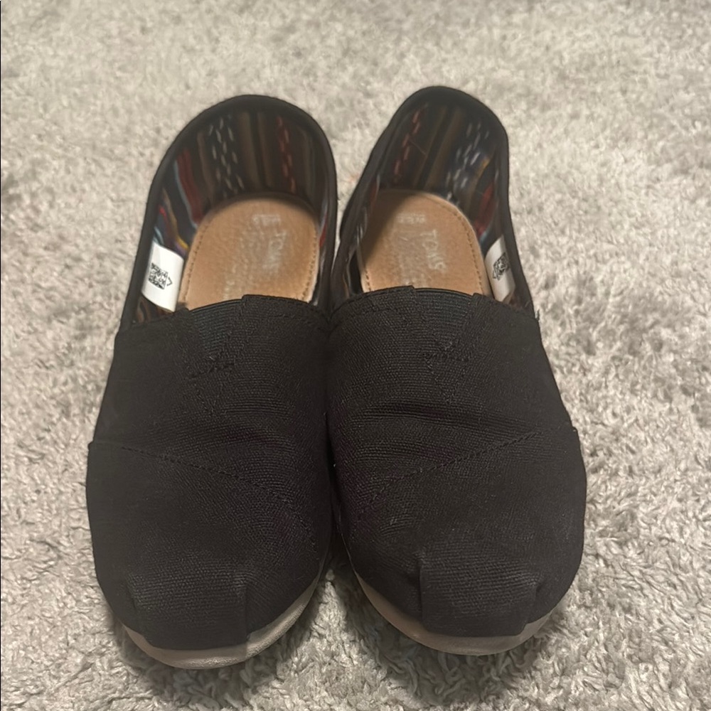 Toms Black Canvas Slip-Ons